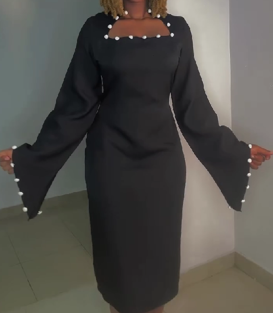 Button-embellished long-sleeved dress